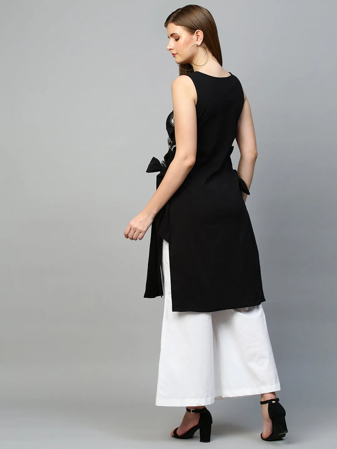 Black top with white pants cord set