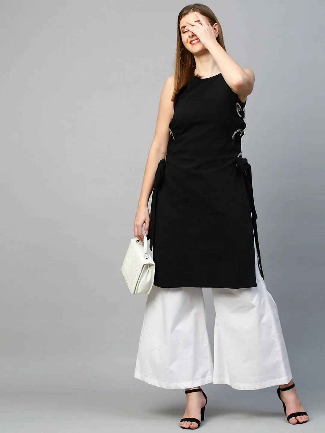 Black top with white pants cord set