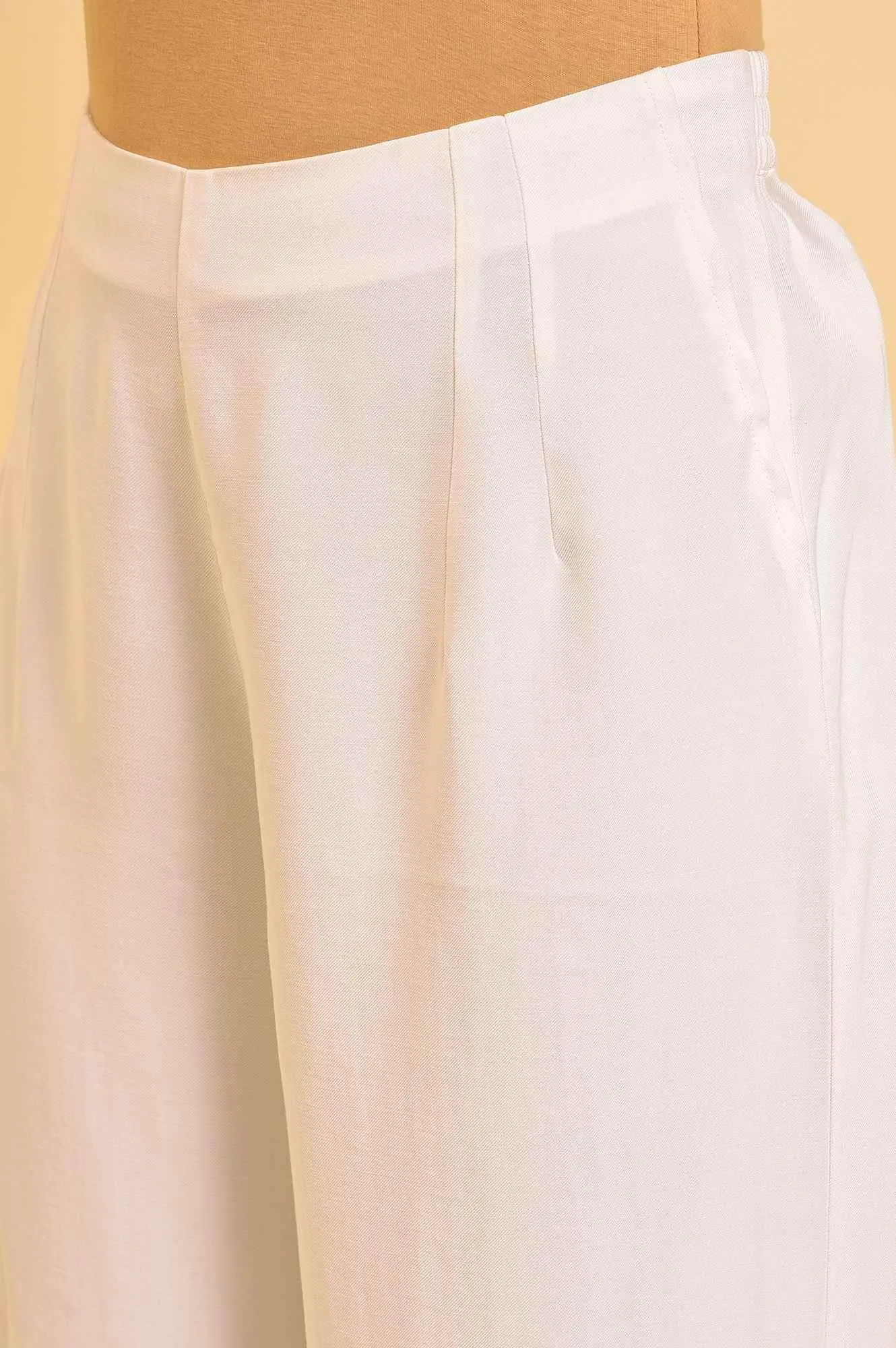Ecru Inverted Box Pleats Flared Pants